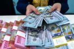 Foto: Uang Dollar dan Rupiah. (Istimewa)